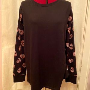 Torrid sweater with leopard skull details